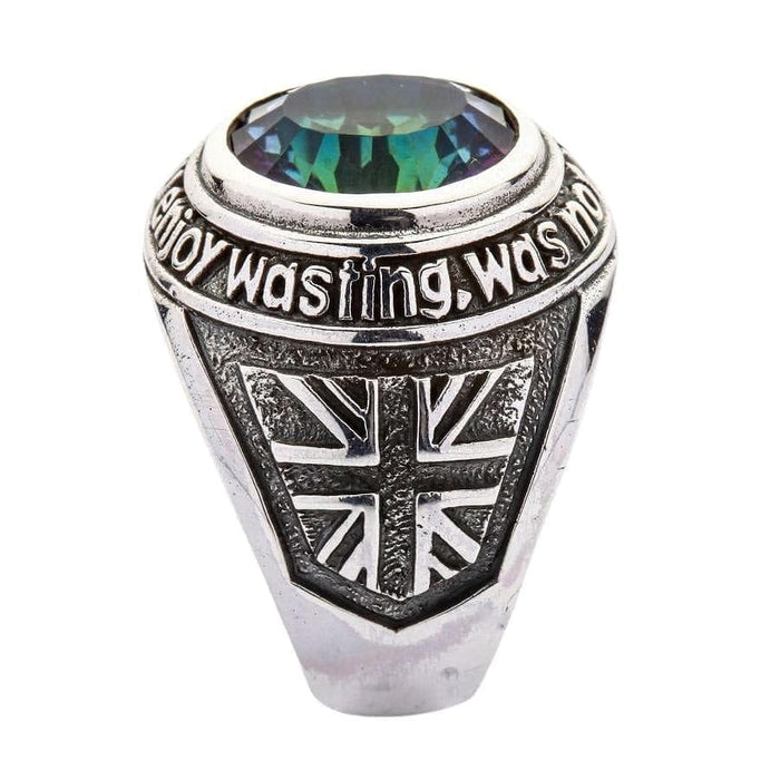 A close-up detail shot of the "Time you enjoy wasting, was not wasted" quote engraved on the silver ring's bezel.