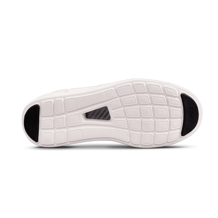 White shoe sole with a grid pattern, black heel and toe pads, and a grey carbon fiber arch insert.
