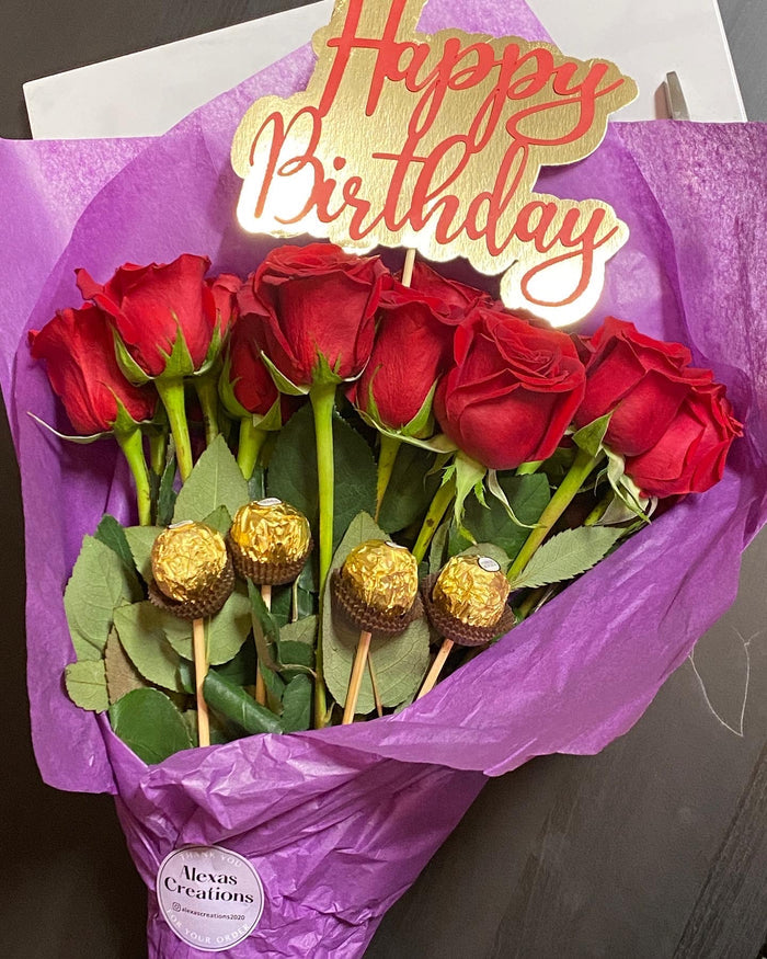 Red roses with custom topper