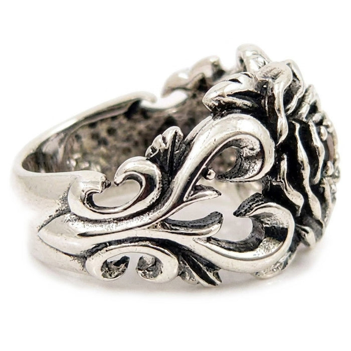 Side profile of rose ring showing thorn cutouts, heart shapes, and scrollwork wrapping the .925 silver band