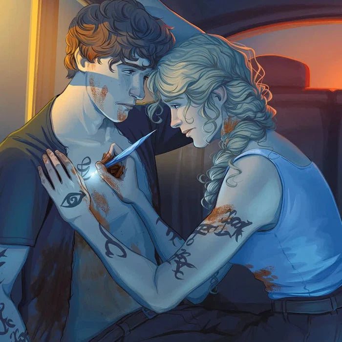 Lady Midnight tip-in exclusive artwork by @taratjah for the LitJoy Crate x Cassandra Clare Dark Artifices Special Edition — depicting two tattooed Shadowhunter characters in an intimate scene with a male using a stele to draw runes on a female's arm, in warm golden amber tones