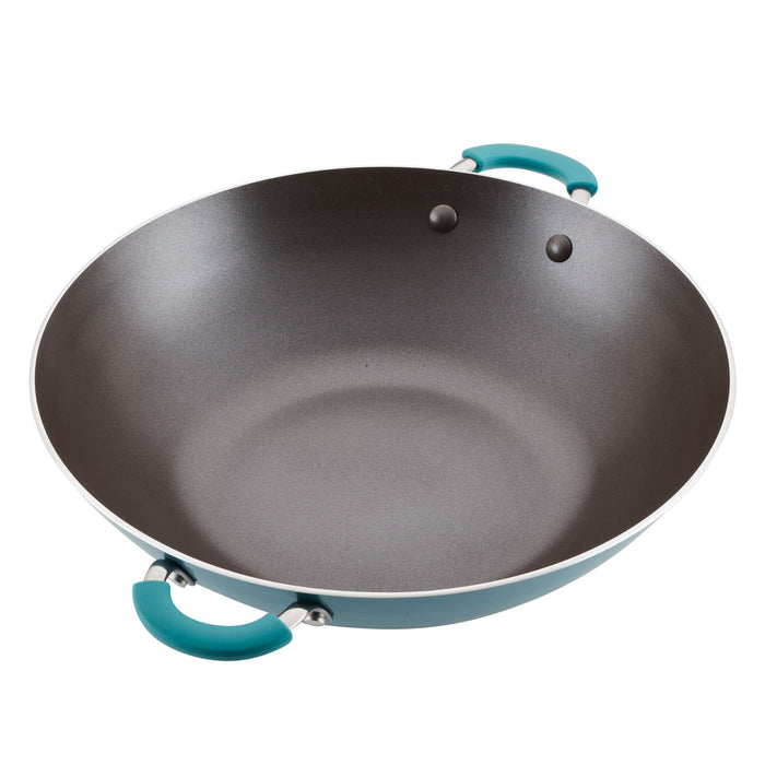 A 14-inch Cook + Create Nonstick Wok featuring scratch-resistant blue handles.