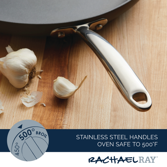14" Hard Anodized Frying Pan handle next to garlic on a wooden surface.