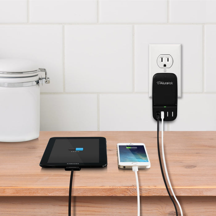 Black 4-port USB charging station with wall outlet and four charging ports