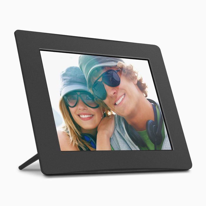 Black digital photo frame angled with a displayed group photo