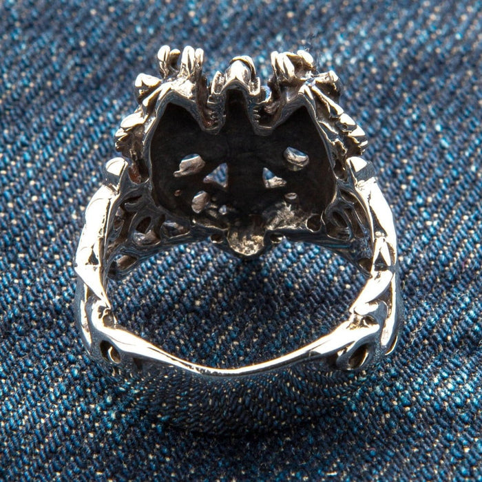 Back view of dragon ring showing hollow interior construction and authentic 925 sterling silver hallmark