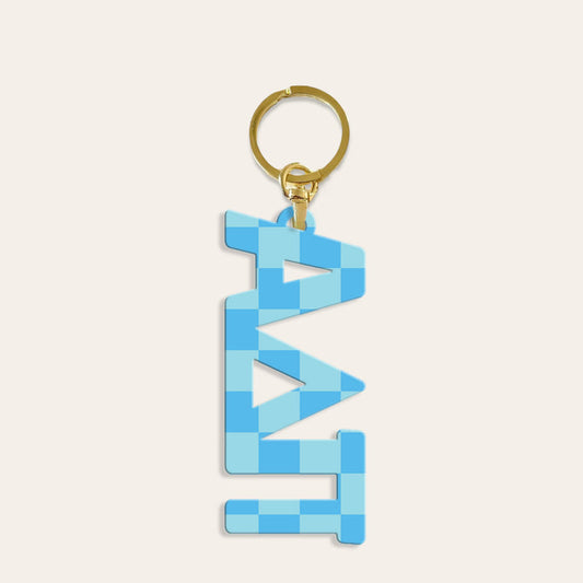The Darling Effect’s Alpha Delta Pi Acrylic Keychain features a gold keychain with a blue checkered “DAD” pendant—a unique sorority accessory and thoughtful bid day gift.