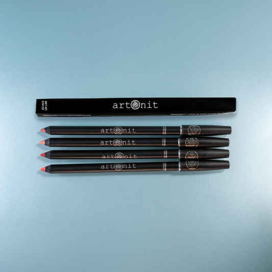 Set of black art pencils with 'artonit' branding on a light blue background
