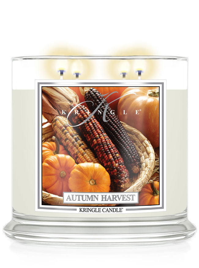 Kringle Candle Autumn Harvest candle with corn and pumpkins on a white background