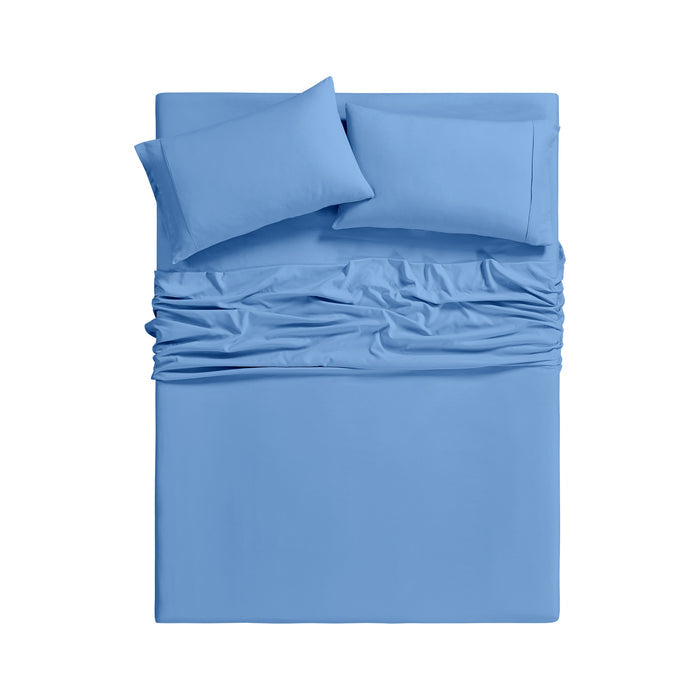 A top-down view of a bed made with a solid light blue bedding set, including a flat sheet, two pillowcases, and a gathered duvet cover, on a plain white background.