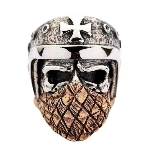 A large sterling silver biker skull ring featuring a detailed helmet and a realistic, textured copper bandana.