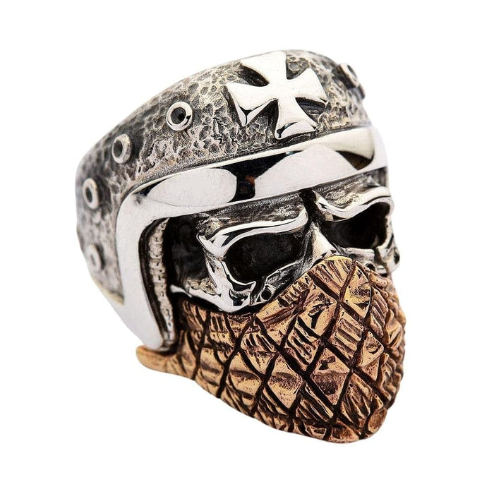 A premium piece of biker skull jewelry: a heavy, solid ring of a skull wearing a helmet and a copper bandana.