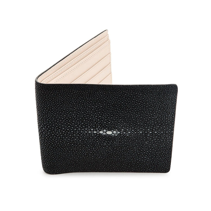 The exterior of a premium black stingray leather wallet, showing the unique pebbly texture and the distinctive white pearl mark.