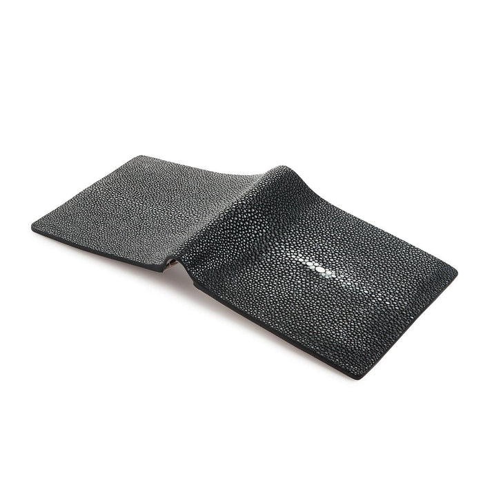 An exotic leather wallet for men, expertly crafted from authentic and durable black stingray skin.