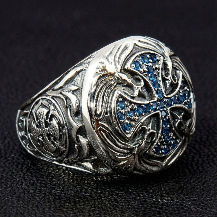 Right side profile highlighting the vine carvings and heraldic medallion on the shank