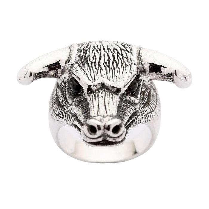 A solid sterling silver bull head ring with genuine black onyx eyes and detailed, ruggedly textured fur.