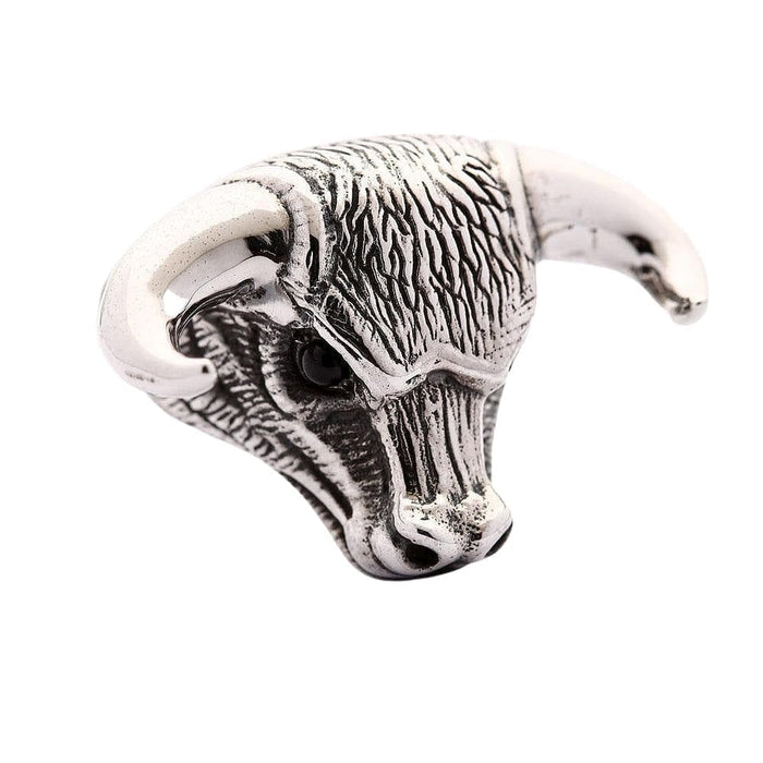 A piece of powerful animal jewelry: a solid sterling silver ring of a charging bull's head, a symbol of strength.