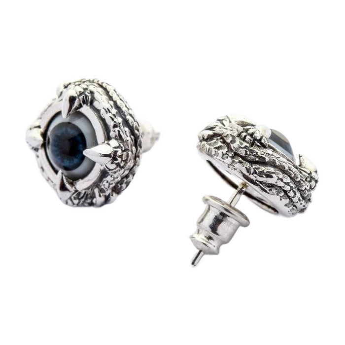 Detailed view of handcrafted claw setting on gothic eyeball earrings showing artisan silver craftsmanship