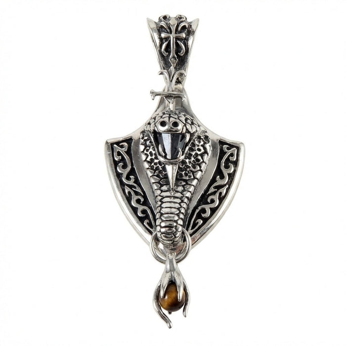 Front view of handcrafted cobra shield pendant featuring raised snake design and dangling tiger eye gemstone