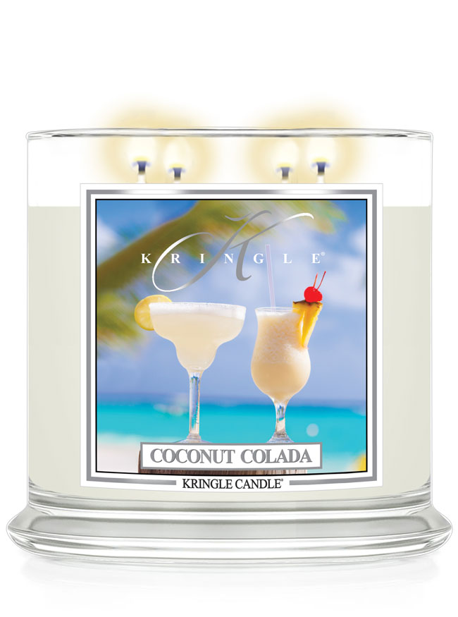 Kringle Candle Coconut Colada scented candle with a tropical design on the label.