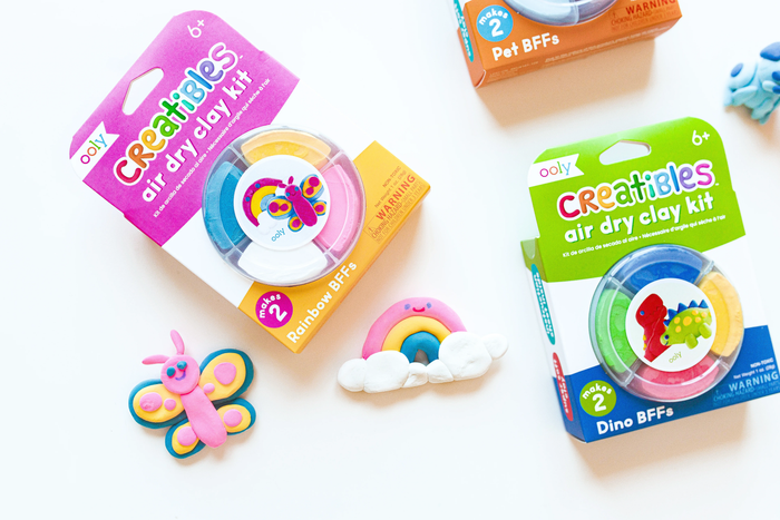 Packages and completed rainbow and butterfly from Rainbow and Dinos OOLY Creatibles Mini Air Dry Clay BFF Kits