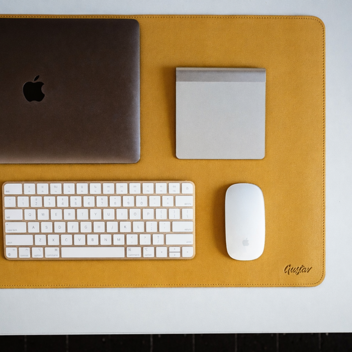 FlexMat desk mat – flat lay on shared desk setup