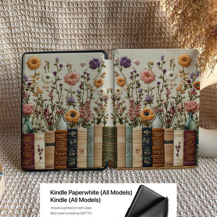 Floral design Kindle case on a textured surface with a blurred background