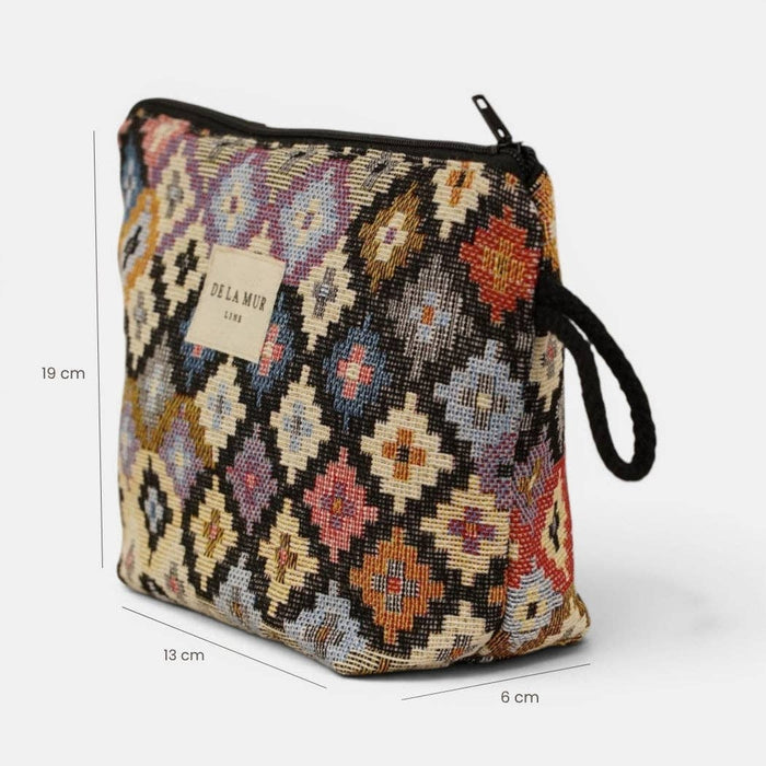 Multicolor geometric jacquard small makeup pouch by DE LA MUR LINE US Inc, featuring intricate pattern and compact design.