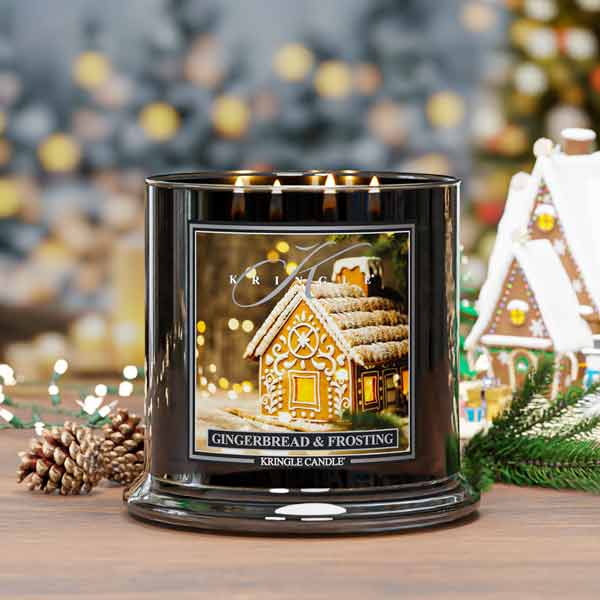 Kringle Candle gingerbread and frosting candle with Christmas decorations in the background