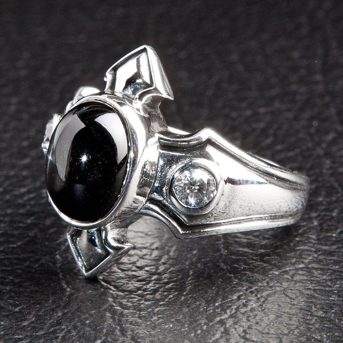 Side profile of handcrafted sterling silver ring showing Cubic Zirconia setting
