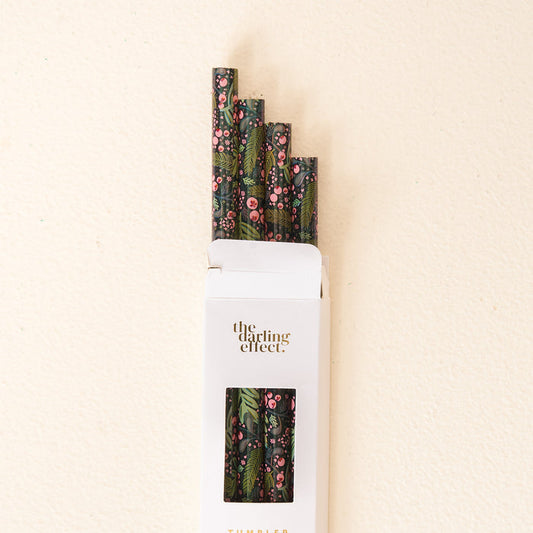 A white box labeled The Darling Effect holds the Jolly Sprig Green 40 oz Tumbler Straw Set, featuring BPA-free straws with floral and leafy designs, partially sticking out against a light background.
