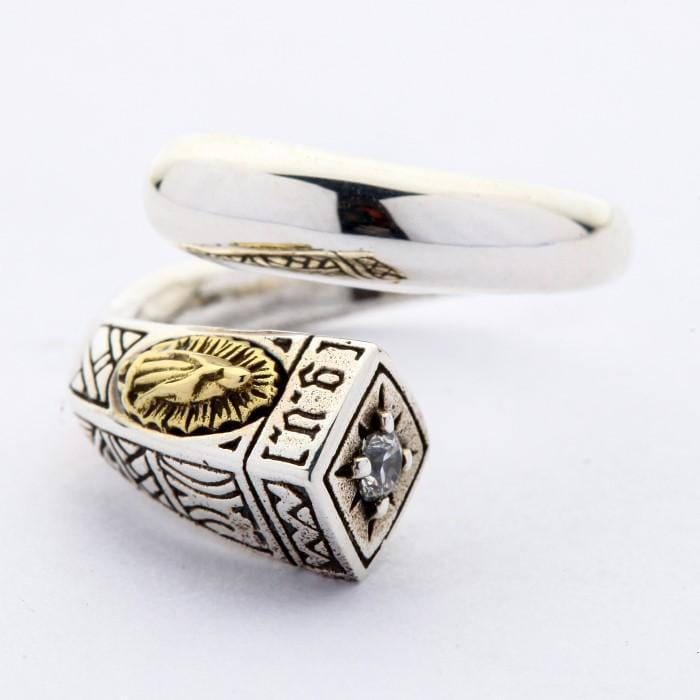 A close-up of the brass inlay of the Virgin Mary on the adjustable wrap ring.