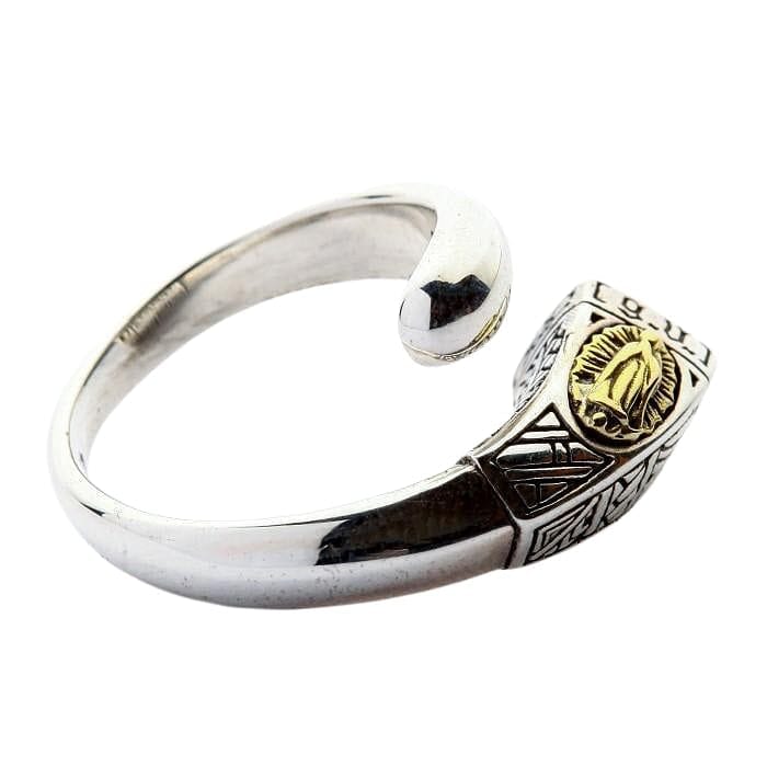 A side view of the Our Lady of Guadalupe ring, showing the oxidized engravings.