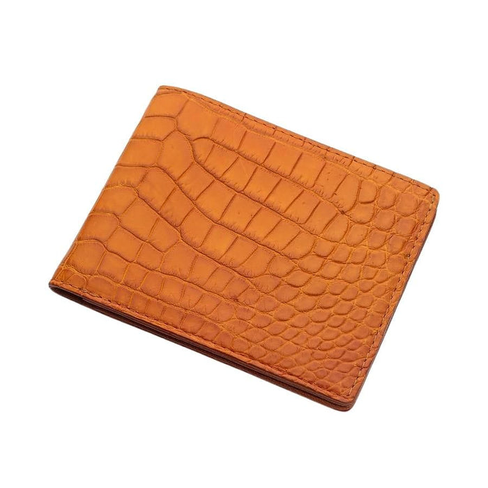 An angled view of the men's exotic light brown crocodile leather wallet.