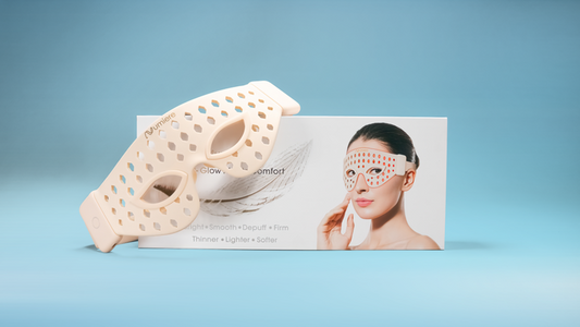 FACIAL MASK AND ITS PACKAGING ON A BLUE BACKGROUND