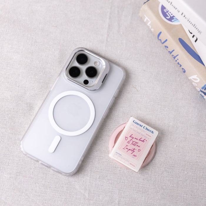 Phone case with a stand feature on a light gray surface