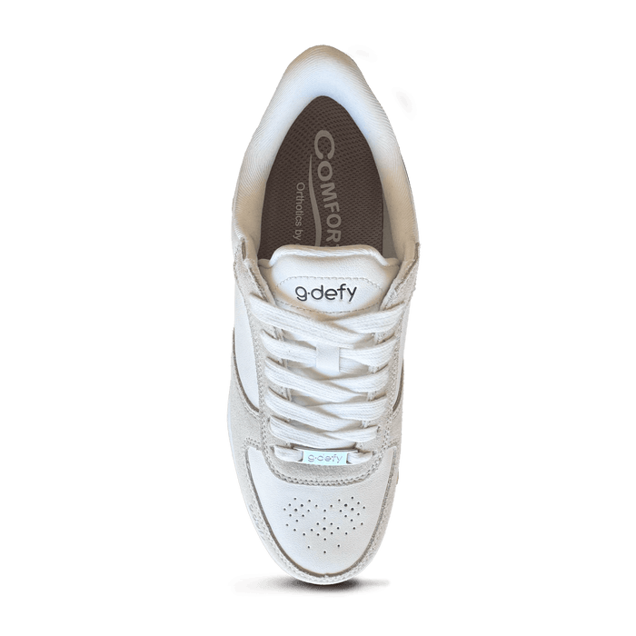 White sneaker, top-down view, with g-defy branding, white laces, perforated toe box, and light grey suede accents.