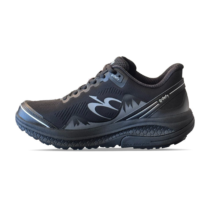 Black g-defy running shoe with grey accents and a textured shock absorption sole.