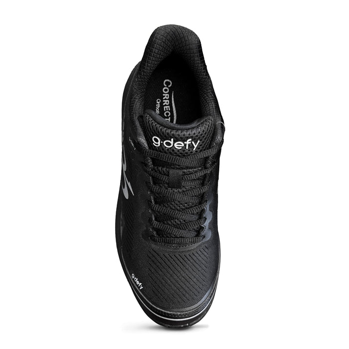 Black athletic shoe with mesh upper, black laces, and white "g-defy" branding, viewed from above.