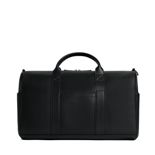 Carbon Black (Vegan Leather) Scaled | Front view of Metro Carry-All Duffel in Carbon Black