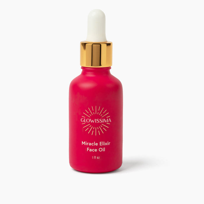Red face oil bottle with gold cap and 'Glowissima' branding on a white background
