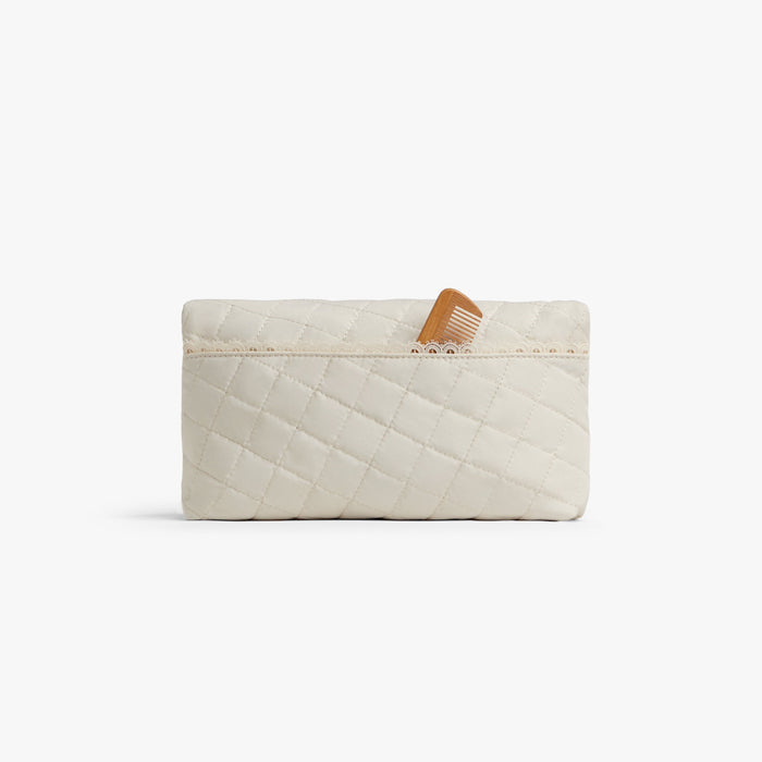 Cream | Back view of Monos x Reformation cosmetic pouch in cream