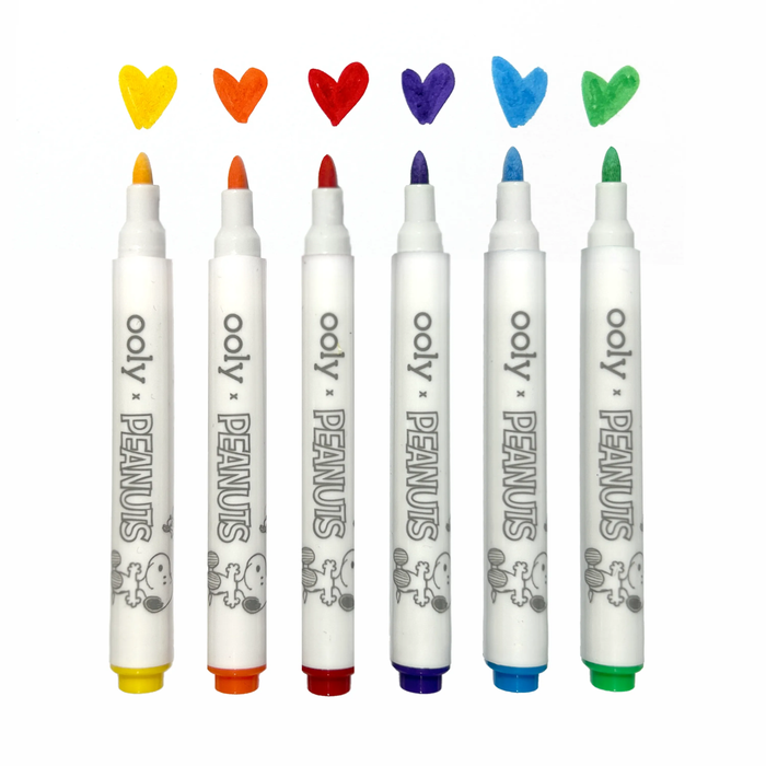 Row of markers with colored heart shaped swatches from the OOLY x Peanuts DIY Shrink Art Kit