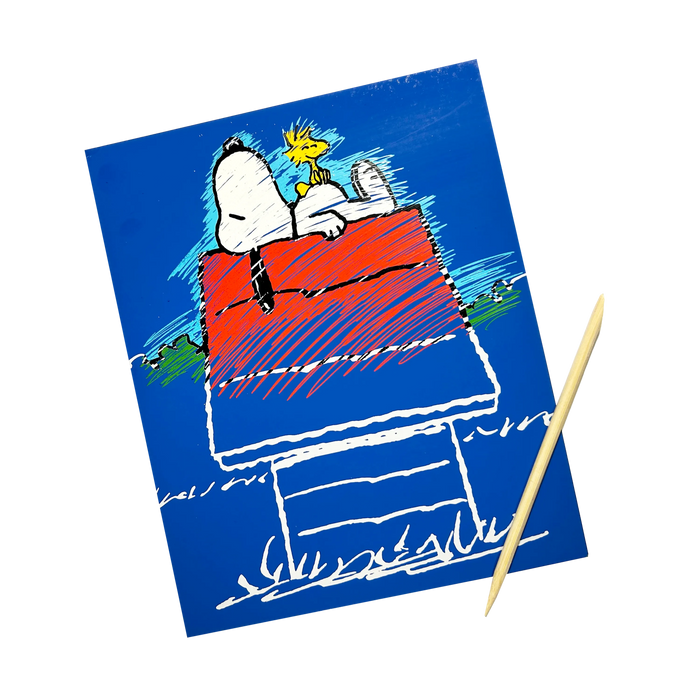 Partially scratched OOLY x Peanuts Scratch Art Kit showing Snoopy and Woodstock on Snoopy's doghouse