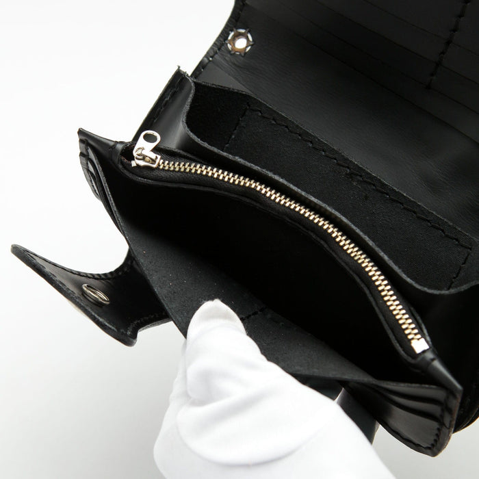 A close-up of the secure zip compartment inside the men's leather biker wallet.
