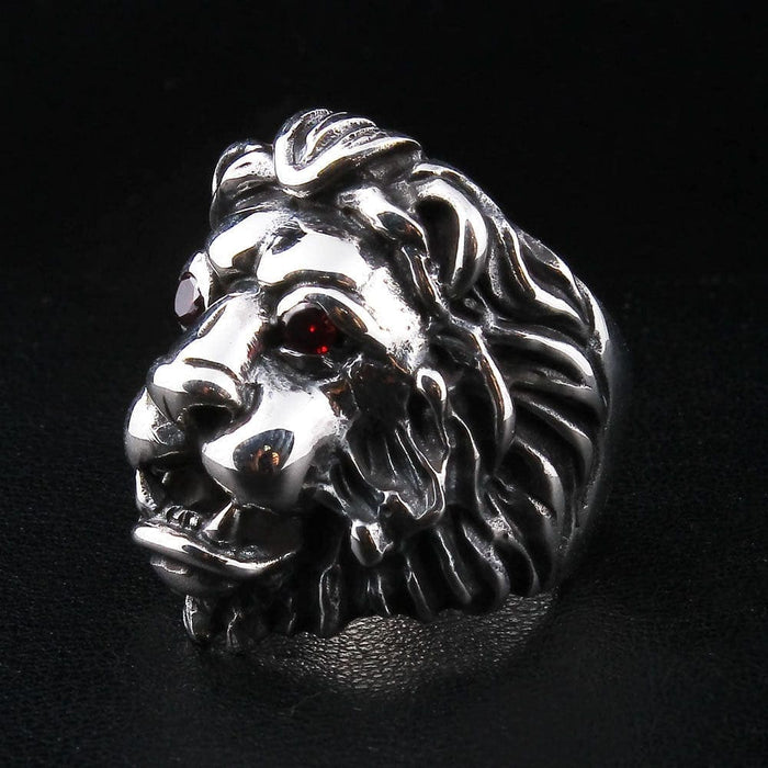 Angled shot of the 37g heavy sterling silver lion ring, highlighting the deep carving.