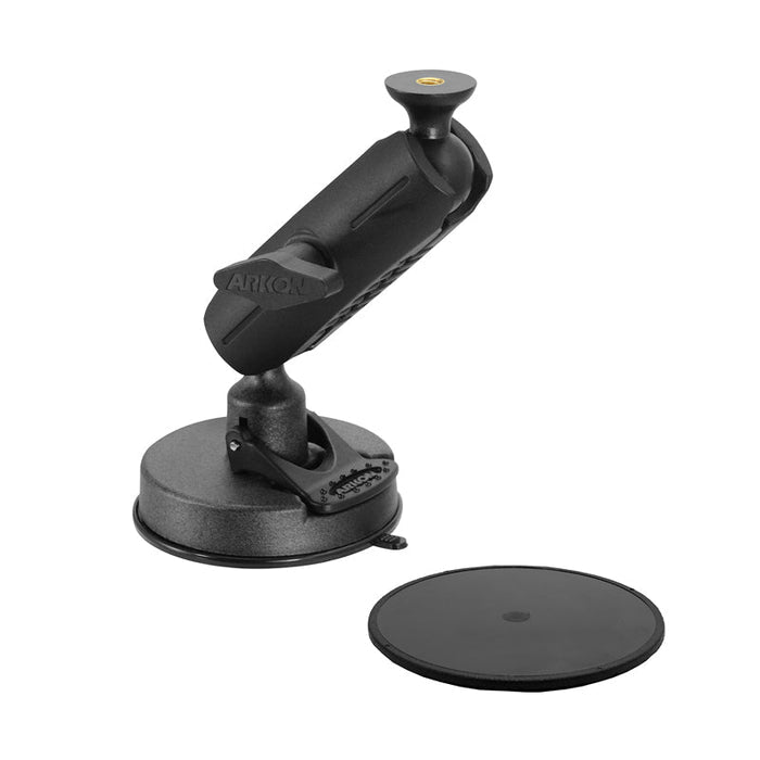 The Robust Heavy-Duty Windshield Suction Mount, shown in black with a rotating arm and separate flat circular plate, is 1/4-20 bolt compatible for versatile device attachment. Both items are displayed on a white background.