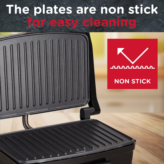 Black sandwich press with non-stick feature on a wooden surface - Buy Now Panini Press, Sandwich Toaster & Health Grill