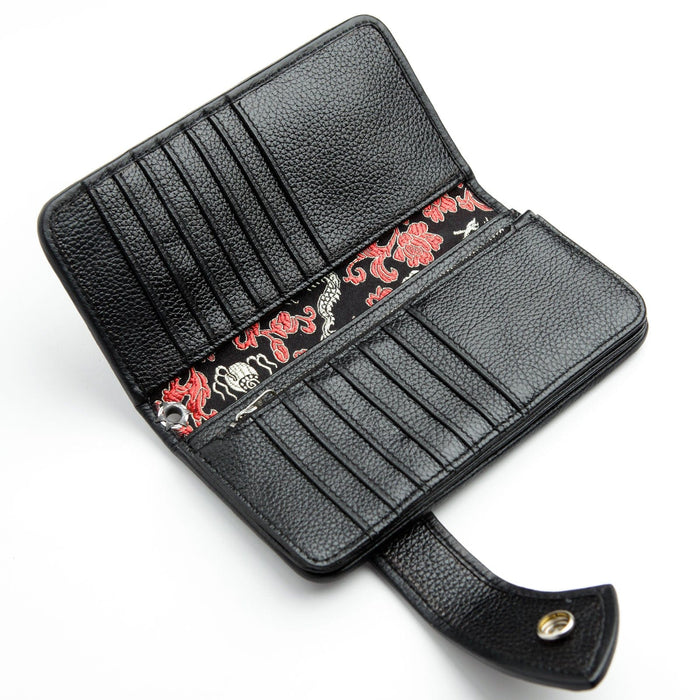 The spacious open interior of a black leather biker wallet, showing its 14 card slots and multiple large compartments.