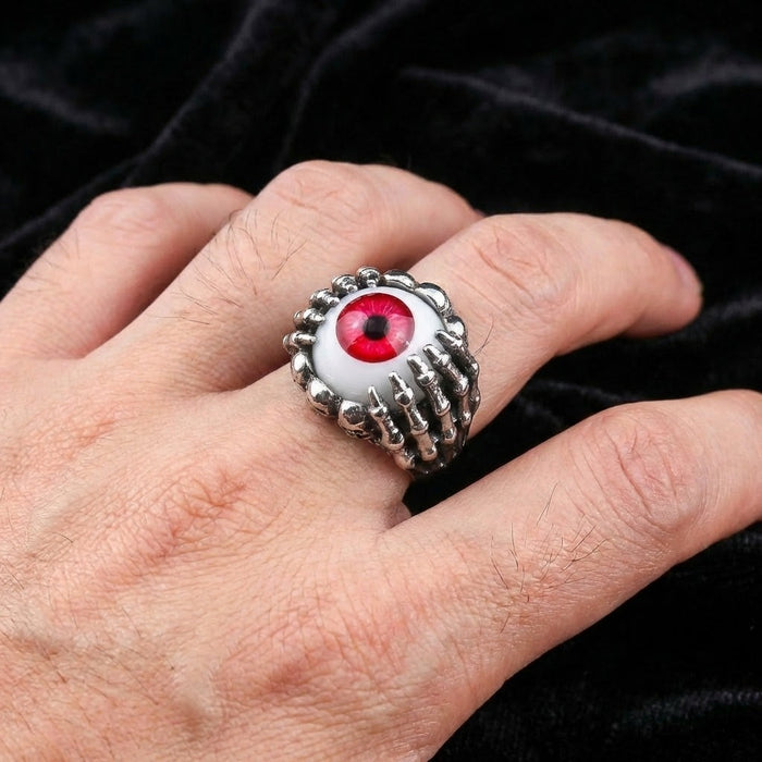 925 sterling silver skeleton claw red eye ring worn on middle finger showing actual size and fit